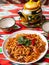 The oriental lagman dish is homemade noodles fried with meat, vegetables and herbs. Eastern cuisine