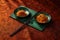 Oriental Rice Dishes with Chopsticks on a Clothed Table