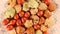 Oriental snack mix 4k video spinning clockwise slowly top down view