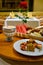 Oriental sweets and fruits on a plate in an Arab restaurant