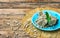 Oriental sweets, slices halva on turquoise ceramics plate