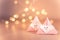Origami Xmas scene with Santa claus and bokeh lights