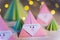 Origami Xmas scene with Santa claus and crhistmas trees in paper craft