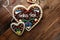 original bavarian christmas gingerbread heart on wood. xmas gingerbread cookie.