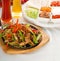 Original fajita sizzling hot on iron plate