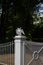 The original fence of the Park: a white eagle with two heads looking in different directions, a fence with spikes and a gate