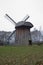 Original historic wooden windmill in the Polish open-air museum in autumn