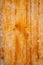 Original old background of natural yellow plywood with cracks
