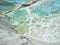 Original Pamukkale place in Turkey in Asia landscape with limestone pools with blue warm water