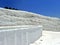 Original Pamukkale place in Turkey in Asia landscape with limestone pools with blue warm water