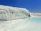 Original Pamukkale place in Turkey in Asia landscape with limestone pools with blue warm water