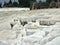 Original Pamukkale place in Turkey in Asia landscape with limestone pools with blue warm water