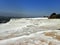 Original Pamukkale place in Turkey in Asia landscape with limestone pools with blue warm water