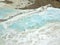 Original Pamukkale place in Turkey in Asia landscape with limestone pools with blue warm water