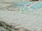 Original Pamukkale place in Turkey in Asia landscape with limestone pools with blue warm water