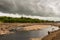 Original river channel and gravel bars exposed due to draining Earlstoun Dam