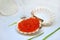 Original serving of red caviar in a shell delicious appetizer seafood