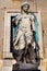 Original statue of Michael the Archangel by Raffaello da Montelupo in front of Castel Sant`Angelo i Rome, Italy