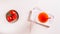 Original tomato martini cocktail in glasses and tomatoes on a plate top view web banner