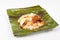 Original traditional simple nasi lemak in banana leaf