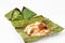 Original traditional simple nasi lemak in banana leaf