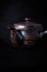 Original, traditional tea pot on a black background