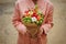 The original unusual edible vegetable and fruit bouquet in woman hands