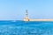 The Original Venetian Lighthouse in Chania Protects the Harbour. Blue Sea and Sky at Summer Season in West Crete, Greece