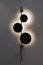 Original wall lamp, wall lamp black in the form of circles on the wall, backlit, night decorative lamp