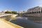 Orihuela, Spain - November 16, 2019: View of the Spanish city of Orihuela on the banks of the Segura river with colorful houses