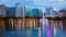 Orlando, Florida City Skyline on Lake Eola as Night Falls logos