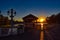 Orlando, Florida. September 29, 2018. Streetlight and Wharf of Water taxis on colorful sunset background at Lake Buena Vista area