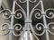 Ornament, detail of an iron gate.Decor and ornament of iron-forged city streets. Old Tbilisi architecture