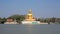 Ornament: huge gold buddha statue near river