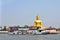 Ornament: huge gold buddha statue near river