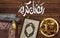 Ornamental Arabic lantern oud perfume with black rosary, prayer mat and holy book, dates. arabic text mean Ramadan Mubarak. Transl
