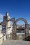 Ornamental arches on roof top terrace and mosque tower in Tunisia