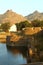 Ornamental battlement and trench at vellore fort with hills beautiful landscape