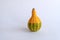 Ornamental bicolor pumpkin on white background