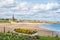 Ornamental Boat containing Flowers, with Tynemouth`s Coastline i