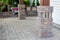 Ornamental brickwork around wooden pergola legs