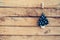 Ornamental christmas tree hanging on wooden for christmas background with space