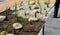 Ornamental flowerbed with perennials and stones made of gray granite, mulched pebbles in the city garden, prairie, ornamental gras