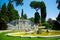 Ornamental fountain in city park over the Lake Como in Tremezzo town, Italy