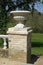 Ornamental jardiniere on brick pillar