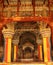 Ornamental king sarafoji siting doom and pillars in ministry hall- dharbar hall- of the thanjavur maratha palace