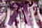 Ornamental knot made of purple satin ribbon