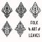 Ornamental leaves folk art graphic design element set. Hand drawn linocut block print style. Black folkloric leaf clip art