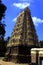 Ornamental temple main tower with clouds and tree