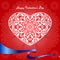 Ornamented heart on red background